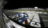 Check it out! Larson celebrates history-making win at Charlotte