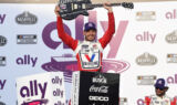 Cue the guitar solo! Check out Larson celebrating his Nasvhille win