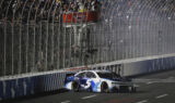 Check it out! Larson celebrates history-making win at Charlotte
