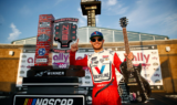 Cue the guitar solo! Check out Larson celebrating his Nasvhille win